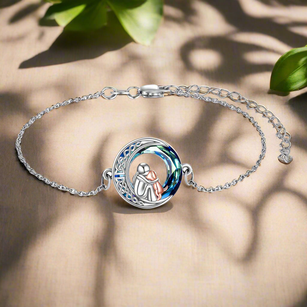 Adjustable bracelet with dog-shaped charm in sterling silver